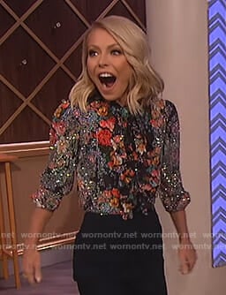 Kelly Ripa’s floral embellished blouse on The Wendy Williams Show