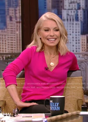 Kelly’s pink v-neck sweater on Live with Kelly and Ryan
