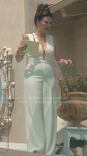 Lisa’s white jumpsuit with barbells on The Real Housewives of Beverly Hills