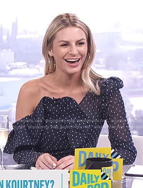 Morgan’s navy polka dot one-shoulder top on E! News Daily Pop