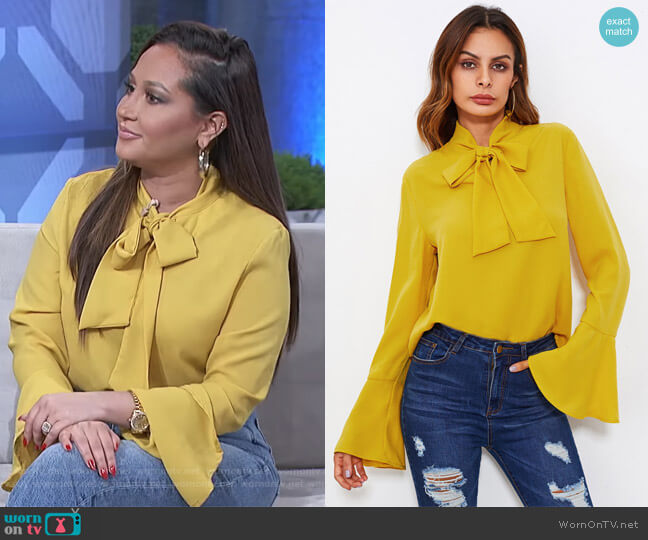 Shein Bow Tied Neck Bell Cuff Curved Hem Blouse worn by Adrienne Houghton on The Real