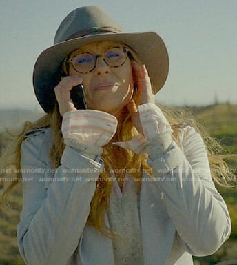 Abby’s pink striped shirt and speckled sweater on 9-1-1