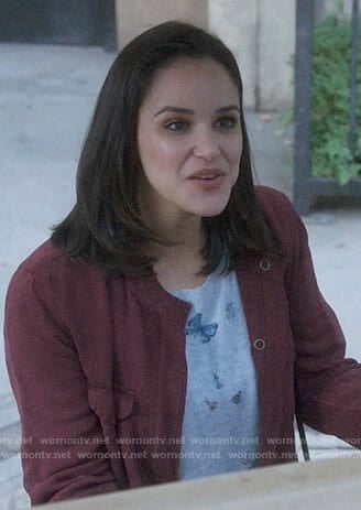 Amy’s butterfly print sweater on Brooklyn Nine-Nine