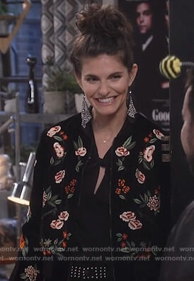Leslie’s black floral bomber jacket and studded pants on Living Biblically