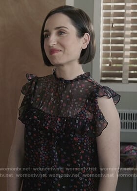 Jen’s black floral print ruffle sleeve top on Life in Pieces