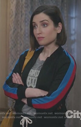 Jen’s gray print t-shirt and track jacket on Life in Pieces
