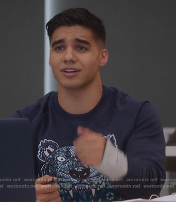 Vivek’s blue embroidered tiger sweater on Grown-ish
