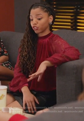 Jazlyn’s red velvet and lace sleeve top on Grown-ish
