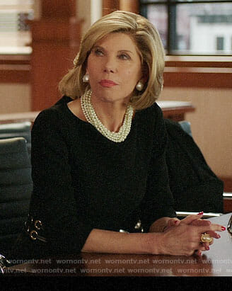 Diane’s black dress with grommet waist on The Good Fight