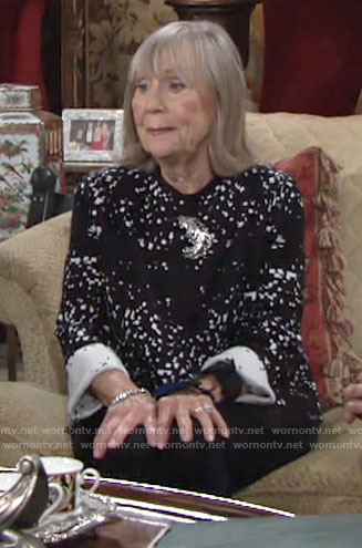 Dina’s black and white printed cardigan on The Young and the Restless