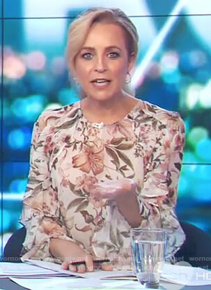 Carrie’s floral print ruffle sleeve blouse on The Project