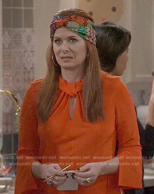 Grace’s red twist front blouse and head scarf on Will and Grace