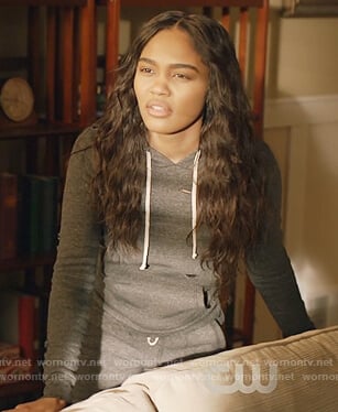 Jennifer’s black distressed sweatshirt and pants on Black Lightning