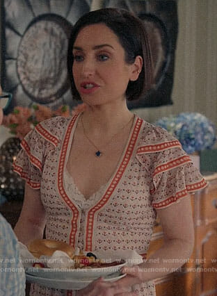 Jen’s floral dress with ruffled sleeves on Life in Pieces