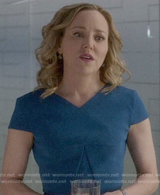 Marissa’s blue v-neck dress on Bull