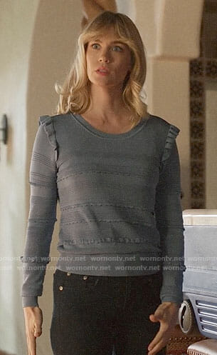 Melissa’s blue ruffled trim sweater on Last Man on Earth