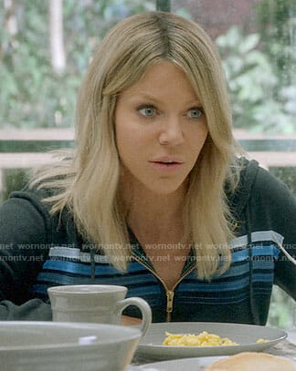 Mickey’s hoodie with blue stripes on The Mick