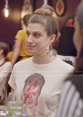 Nomi’s David Bowie tee and red striped pants on Grown-ish