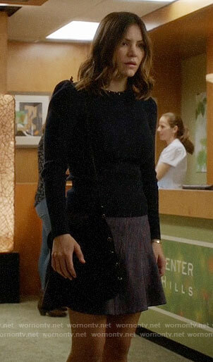 Paige’s black puff-shoulder sweater on Scorpion