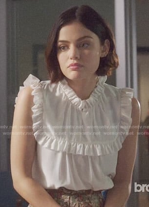 Stella’s white ruffled top on Life Sentence