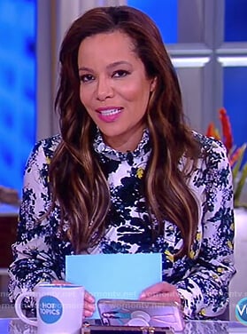 Sunny’s white floral print ruffle collar dress on The View