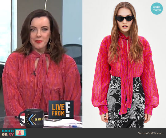 Zara Shimmery Blouse with Bow worn by Melanie Bromley on E! News