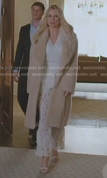 Alexis’s fur coat and white lace trousers on Dynasty