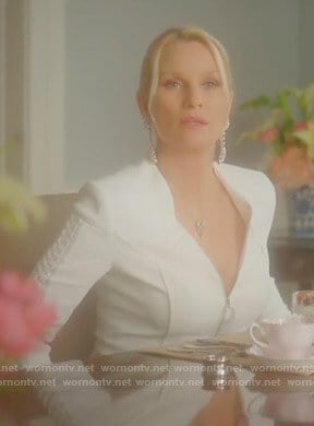 Alexis’s white lace-up sleeve zip jacket on Dynasty