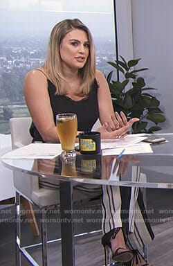 Carissa’s black lace trim camisole and striped trousers on E! News Daily Pop