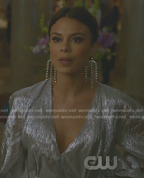 Cristal’s metallic wrap dress and statement earrings on Dynasty