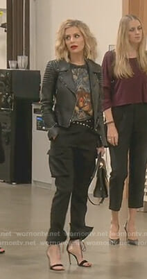 Dorit’s black tiger print top and lace up pants on The Real Housewives of Beverly Hills
