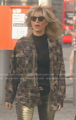 Dorit’s star print camo jacket and chain embellished boots on The Real Housewives of Beverly Hills