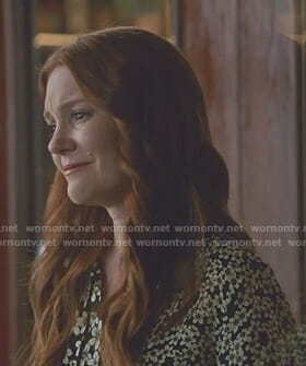 Abby’s black floral blouse on Scandal