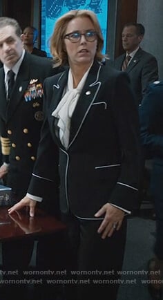 Elizabeth’s black blazer with piping trim on Madam Secretary