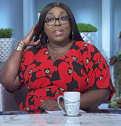 Loni’s black and red floral print jumpsuit on The Real