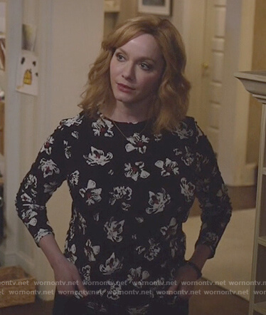 Beth’s black floral print long sleeve top on Good Girls