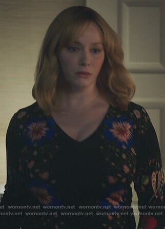 Beth’s black v-neck floral print sweater on Good Girls