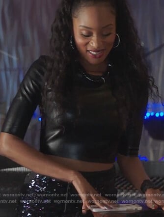 Tangey’s black leather top and sequin embellished skirt on Famous in Love