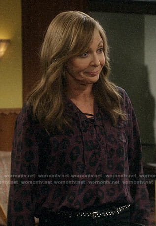Bonnie’s purple leopard print lace-up top on Mom