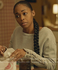Anissa’s gray lace-up sleeve sweatshirt on Black Lightning