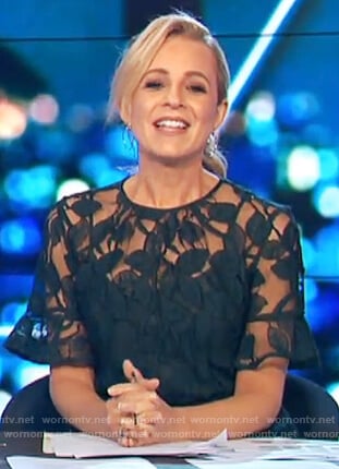 Carrie’s green floral lace dress on The Project