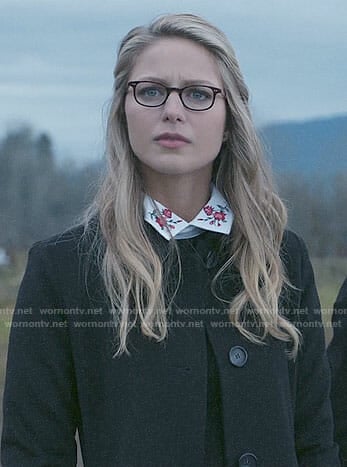 Kara’s black sweater with floral collar on Supergirl