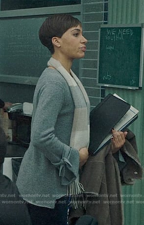 Lucca’s grey tie-cuff sweater on The Good Fight