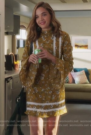 Cassandra’s yellow floral print lace trim dress on Famous in Love