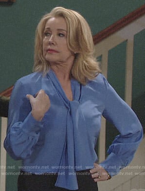 Nikki’s blue tie neck blouse on The Young and the Restless