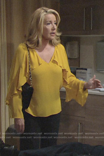 Nikki’s yellow ruffled blouse on The Young and the Restless