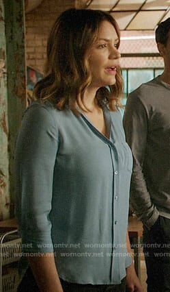 Paige’s blue button down blouse on Scorpion