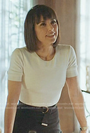 Quinn’s black and white belted dress on UnReal
