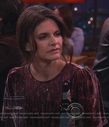 Leslie’s red velvet floral smocked front top on Living Biblically
