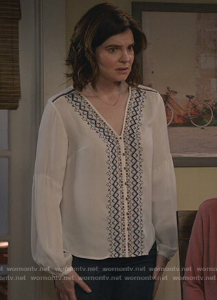 Heather’s white v-neck embroidered top on Life in Pieces